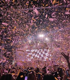 confetti is thrown in the air at a concert