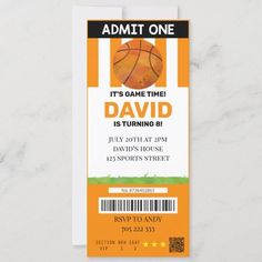 an orange ticket for a basketball game with the words, it's game time is turning