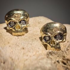 Delicate Skulls, gothic luxury, delicate skulls realized and set by hand in 9K gold, Made in Florence!  These baby skulls have 'cracked' detail on the upper angles, tiny diamond eyes, with black rhodium detail in the eye sockets, which make the 1.4mm diamond eyes pop. Gold Skull-shaped Earrings, Elegant Skull Ring As Gift, Elegant Skull Ring Gift, Gothic Skull Jewelry For Formal Occasions, Gothic Luxury, Vintage Occult, Diamond Skull, Gold Skull, Wrap Earrings