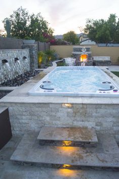 an outdoor hot tub with the words swim spa installation ideas above it and below it