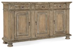 an old wooden sideboard with carvings on the top and bottom panel, isolated against a white background