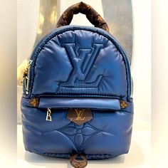 Wow This Bag Is Straight From The Runway, This Super Rare Bag Is In The Limited Edition Blue Pillow Fabric Design, With Canvas Tan And Accents. In Excellent Condition. This Bag Is Not New And Has Been Carried But It’s In Excellent Shape. Yes, It’s Authentic My Price Is Firm Trusted Seller With Many Lv Bag Sales Comes With The Mono Straps (To Wear As Backpack) Lightweight And Ultra Comfy To Wear Limited Edition And Sold Out. Ships With The Lv Box, Product Care Tags Thanks For Looking And Happy Po Designer Blue Backpack For Daily Use, Luxury Blue Standard Backpack, Luxury Blue Backpack Bag, Designer Blue Backpack For Everyday Use, Luxury Blue Backpack, Designer Blue Backpack, Designer Blue Standard Backpack, Palm Spring Mini, Louis Vuitton Palm Springs Mini