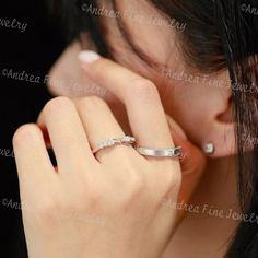 a close up of a person wearing a ring