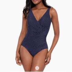 Nwot $170 Miraclesuit Swim Pin Point Oceanus One Piece Swimsuit Midnight Blue 18 Bathing Suit Polks Dots Retail: $170 Still On The Website. Blue White New Without Tags, Has Its Hygiene Liner. From The Pin Point Collection.Look 10 Lbs. Lighter In 10 Seconds. Our Exclusive Miratex Fabric Slims And Slenderizes Without Panels Or Linings For Total Full Body Shaping And Control. Designed With Full Coverage, Miraclesuit's Oceanus Wireless One-Piece Features A Polka-Dot Print And Surplice Neck. Surplice Elegant Blue V-neck Swimwear, Navy Fitted V-neck Swimwear, Purple Bathing Suit, Bathing Suits One Piece, Women Bathing, Floral One Piece Swimsuit, Floral One Piece, 10 Seconds, Dot Print