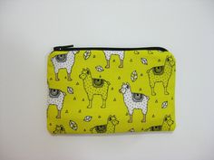 "Small zipper pouch is great for credit cards, cosmetics, change, jewelry, or whatever you want to organize in your handbag, backpack or just slip it in your pocket. Great for traveling. Size: 3 1/4 \" high 5\" wide Yellow zipper pouch with lamas. Material used: 100% cotton fabric, fully lined with a thin layer of fleece, interfacing for durability, and a zipper. Pattern placement will vary slightly on each pouch. Great little Thank You gift. Care: Machine was cold or hand wash, lay flat to dry. Cat Wallet, Small Zipper Pouch, Bus Card, Vegan Wallet, Fabric Wallet, Small Pouch, Small Pouches, Minimalist Wallet, Mini Wallet