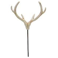 an antler's head is shown on a stick