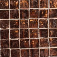 a close up view of some brown glass tiles