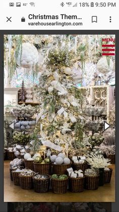 a christmas tree is surrounded by baskets