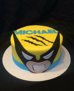 a cake that has been decorated to look like the wolverineman face on top of it