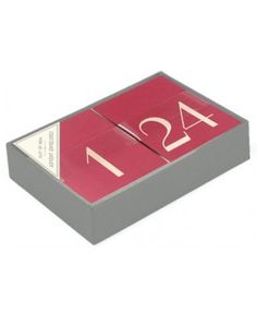 a red and grey box with the number four on it