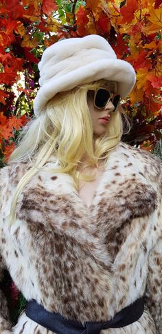 "Lovely vintage original 1990s white faux fur bucket hat with brim by Whitely. Gorgeous thick fluffy faux fur in white. White silky fabric lining on the inside. A lovely retro glamerous piece. Warm and cosy, perfect for Autumn and Winter. Material: synthetic fibres. Condition: The piece has been carefully hand washed and is in very good vintage condition. Size: 🦋measurements to follow shortly🦋 Circumference: xx inches About: \"Mijkra\" is a UK based artist/photographer and designer creating and sourcing unique original pieces in a converted stable/barn in the heart of Oxfordshire and in the back of a vintage campervan. This store, hosted by Etsy, will showcase and sell a range of unique artisan bohemian hand created clothing, \"art to wear\", accessories,  jewellery and homeware, remodel White Hat With Faux Fur Lining For Winter, White Winter Hat With Faux Fur Lining, White Faux Fur Winter Hat, Fur Bucket, Russian Hat, Faux Fur Bucket Hat, Fur Bucket Hat, Synthetic Fibres, Silky Fabric