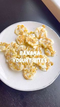 banana yogurt bites on a white plate with the words banana yogurt bites