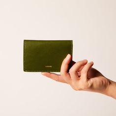 Compact cardholder with a simplistic silhouette and colorful inside, crafted from natural cactus and plant-based materials. This bi-fold cardholder is all you need for a quick errand, with just enough space for an ID, cash and ATM cards. The sleek appearance of will also complement any outfit. Dimensions Approx. 4" L x 2.8" H Easily to be carried in a pocket Actual product appearance may vary due to natural materials Selected Leather Material Certification Cactus Leaves, Atm Card, Green Cactus, Leather Material, Natural Materials, Plant Based, Cactus, Card Holder, Sleek