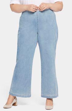 Polished wide-leg jeans offer a fit you'll love with stretchy denim, a pull-on waist and Lift Tuck® Technology that smoothes and supports in front and lifts in back. 31" inseam; 24" leg opening; 12" front rise; 19" back rise Pull-on style Back patch pockets 86% cotton, 11% elastomultiester, 3% Lycra® spandex Machine wash, line dry Imported Spring Wide Leg Flare Jeans With Elastic Waistband, Relaxed Fit Flared Cropped Jeans, Casual Flared Cropped Jeans In Relaxed Fit, Casual Flare Cropped Jeans With Relaxed Fit, Spring Stretch Wide Leg Cropped Jeans, Light Wash Wide Leg Pull-on Jeans, Stretch Wide Leg Cropped Denim Jeans, Spring Wide Leg Cropped Pants With Pull-on Style, Spring Cropped Wide Leg Pants