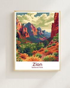 a poster hanging on the wall above a plant filled area with mountains in the background