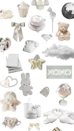 an assortment of baby items are arranged in the shape of a heart and stars on a white background