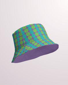 Our reversible bucket hat is made of premium breathable, moisture wicking fabric, and offers UV sun protection, making it perfect for the beach or any outdoor adventure. KEY FEATURES ⬥ Reversible Design: Endless styling possibilities for every occasion. ⬥ Moisture-Wicking Material: Keeps you cool and comfortable in the sun. ⬥ UV Protection: Protects your skin from harmful rays. ⬥ Unisex Style: Suitable for both men and women. PRODUCT SPECIFICATIONS ⬥ 100% premium polyester ⬥ Moisture-wicking and breathable fabric ⬥ Linen feel material ⬥ Reversible ⬥ Sizes available: S/M and L/XL SIZE CHART (also available in listing photos) ⬥ Size S/M: top circumference 23 3/8", crown height 3 1/2", brim height 2 3/4" ⬥ Size L/XL: top circumference 24", crown height 4", brim height 2 3/4" Whether you're re Beach Pool, Matching Accessories, Summer Adventures, Sun Protection, Retro Prints, Outdoor Adventure, Moisture Wicking Fabric, Unisex Fashion, Breathable Fabric