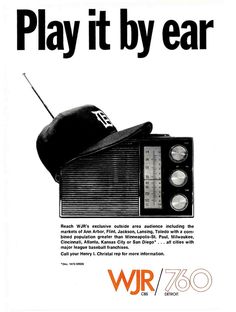 an advertisement for the wjr radio with a black hat on top and words play it by ear