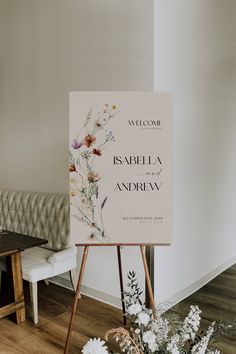 a welcome sign in front of a white couch