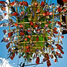 an upside down view of a palm tree filled with candy