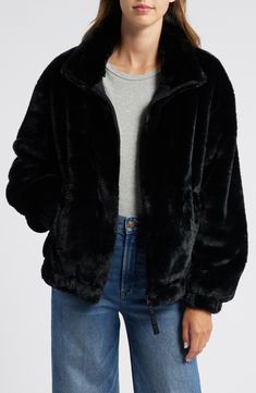 Add a little luxe to your look with a luscious faux-fur jacket designed with hand-warming pockets lined in cozy microsuede. 24" length (size Medium) Front zip closure Stand collar Elastic cuffs and hem Side-seam pockets Lined 100% polyester faux fur Machine wash, tumble dry Imported Black Faux Fur Jacket Outfit, Black Fur Jacket Outfit, Black Fur Coat Outfit, Faux Fur Jacket Outfit, Fur Jacket Outfit, Black Fur Jacket, Ugg Jacket, Fur Coat Outfit, Vintage Faux Fur Coat