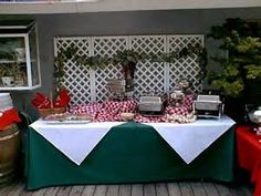 a table covered in red and white cloths