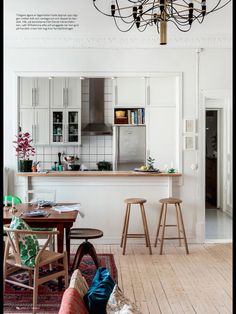 the kitchen is clean and ready to be used as a dining room or living room