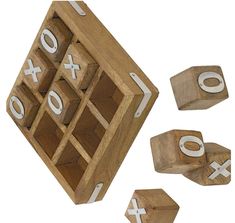 a wooden game set with white numbers and dices