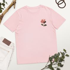 Pink flower tshirt, Flower tshirt, Floral tshirt, Flower illustration, Summer tshirt, Gifts for her *ALL SIZES ARE UNISEX* This T shirt is made from premium Organic cotton with finished hems and a round neckline, the design is printed on the front only, nothing is printed elsewhere. It's ready to pair with all your favorite outfit, dress it up or down and stay comfy while doing so. Added bonus? It's eco-friendly. * 100% organic ring-spun cotton * Fabric weight: 5.3 oz/yd² (180 g/m²) * Single jer Pink Graphic Tee With Plant Print, Pink Graphic Tee With Plants Print, White Cotton T-shirt With Rose Print, Summer Short Sleeve T-shirt With Rose Print, Summer Rose Print Short Sleeve T-shirt, Spring Rose Print Short Sleeve T-shirt, Spring Cotton T-shirt With Rose Print, Pink Cotton T-shirt With Plant Print, Floral Graphic Tee With Screen Print