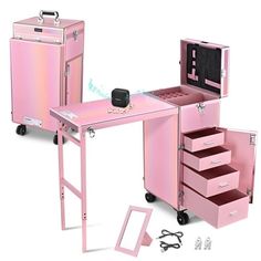 a pink vanity desk with drawers and accessories