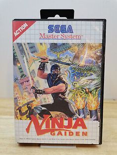 the box for the game ninja gaiden is shown on a wooden table top