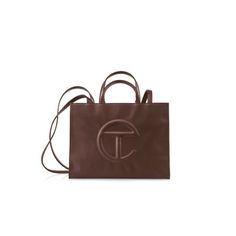 The iconic Unisex TELFAR Shopping Bag is an Everyday bag for Everyone. Telfar Shopping Bag, Medium Chocolate Brown, Chocolate Shop, Logo A, Survival Kit, Everyday Bag, Embossed Logo, Chocolate Brown, Drawstring Bag