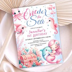 Dive into the magic of the ocean with our "ONEder The Sea" Pink Little Mermaid 1st Birthday Invitation!�🧜‍♀️✨ Make a splash with enchanting underwater vibes and celebrate your little one's 1st birthday party in style! Order your today and make your celebration truly special! Mermaid 1st Birthday, Oneder The Sea, Ocean Party, 1st Birthday Invitation, Sea Birthday, 1st Birthday Invitations, 1st Birthday Girls