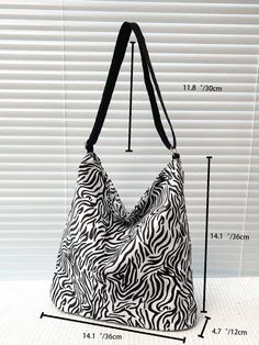 Bag For Love -Zebra Striped Print Crossbody Bag - Women Crossbody Product Description Color Black and White Strap Type Adjustable Pattern Type Zebra Stripe Style Fashionable Bag Size Large Quantity 1 piece Composition 100% Nylon Material Nylon Size Chart INCH CM Size Bag Width Bag Height Bag Length Strap Length one-size 4.7 14.2 14.2 47.2 Size Bag Width Bag Height Bag Length Strap Length one-size 12 36 36 120 Similar Products h2 { text-align: center; } .red-box { width: 100%; display: flex; flex Crossbody Bag Women, Black & White, Bag Women, Olivia Mark, Stripe Print, For Love, Drawstring Backpack, Bags Women, Fashion Bags