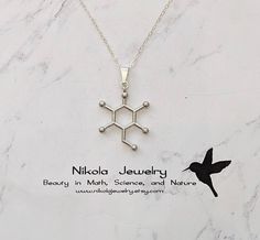 Molecule necklaces were featured on Buzzfeed and BUST magazine Glucose Molecule Necklace in Silver Glucose is a sugar with the molecular formula C 6H 12O 6. Glucose is overall the most abundant monosaccharide, a subcategory of carbohydrates. Purchase includes a molecule information card, a natural jewelry box, and gift packaging.  Gift? Add-on a hummingbird card for only $7: https://www.etsy.com/listing/202506976/nikola-jewelry-hummingbird-card Add-on extender: https://www.etsy.com/listing/197483038/add-on-necklace-extender-chain-with Necklace longer than 20 inches: https://www.etsy.com/listing/196689227/extend-my-necklace-up-to-30-inches Turn pendant into a keychain or ornament: https://www.etsy.com/listing/1003597263/turn-any-pendant-into-a-key-chain-or ★ ITEM DETAILS ★ Chain: Sterling S Glucose Molecule, Jewelry Mockup, Hummingbird Card, Molecule Jewelry, Chemistry Jewelry, Molecule Necklace, Natural Jewelry, Information Card, Necklace Extender