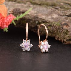 "14k Rose Gold Dainty Flower Earrings, Womens Gold Dangle Earrings, Tiny Womens Earrings, Elegant Earrings Gold This is a stunning, feminine earrings that works well for all occasions, styles, and ages. You will love it! WE OFFER UNLIMITED PERIOD INSTALLMENTS PLAN Earrings information: Main stone: Cubic zirconia Metal type: Gold Metal stamp: 14k Gold Type of earring fasteners - Kidney ear wires Customization / Replacements It's easy to create jewelry that's perfect for you. Change the materials Rose Gold Flower-shaped Earrings, Elegant Pink Cluster Earrings, Round Rose Gold Flower Charm Earrings, Pink Earrings With Lever Back For Anniversary, Rose Gold Dangle Earrings With Flower Charm, Rose Gold Round Flower Charm Earrings, Pink Lever Back Earrings For Anniversary, Rose Gold Flower Charm Earrings, Rose Gold Round Flower Earrings For Anniversary