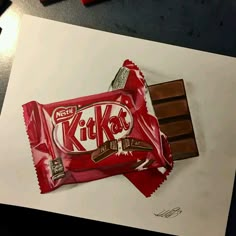 a drawing of a kitkat chocolate bar on top of a piece of white paper