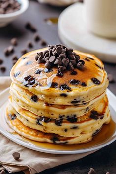 a stack of pancakes with chocolate chips on top