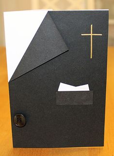 a black card with a cross on it