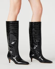 Upgrade your boot game with the LANDER boots. These boots have a square toe, knee-high length, and a trendy kitten heel and elevate any outfit while providing comfort and support. Perfect for everyday wear or dressing up for a night out. 2 inch heel height 14.75 inch shaft circumference 15.25 inch shaft height Leather upper material Textile and synthetic lining Synthetic sock Synthetic sole Imported Trendy Fitted Low Heel Boots, Trendy Fitted Boots With Low Heel, Fitted Mid-calf Boots With Low Heel For Workwear, Chic Fitted Mid-calf Boots With Low Heel, Fitted Mid-calf Boots With Reinforced Heel, Square Toe Knee-high Boots For Night Out In Fall, Low Heel Boots For Night Out In Fall, Fall Low Heel Boots For Night Out, Kitten Heel Boots