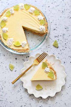 a slice of key lime pie on a plate with a fork