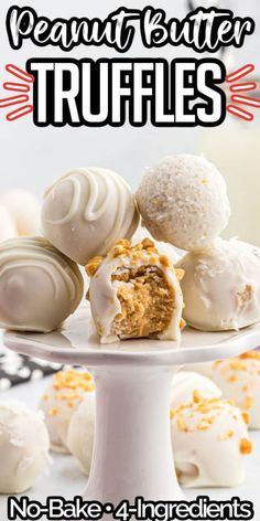 a white cake plate topped with truffles covered in frosting