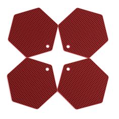 four red hexagonal plates with holes in the middle