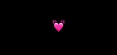 a pink heart on a black background