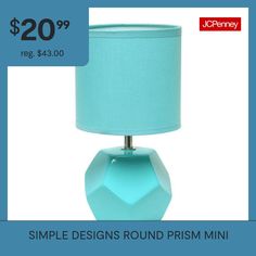 a table lamp with a blue shade on it and the price is $ 20 99