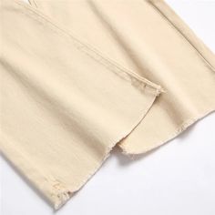 SPECIFICATIONS Brand Name: Dodobye Material: COTTONMaterial: POLYESTERElasticity: Medium StrecthFabric Type: SoftenerLength: full lengthFit Type: regularStyle: CasualDecoration: PocketsDecoration: HOLEDecoration: noneOrigin: Mainland US(Origin)CN: GuangdongJeans Style: FLARE PANTSWaist Type: highModel Number: CD696Release Date: Spring 2023Thickness: regularItem Type: JEANSGender: WOMENPlace Of Origin: US(Origin) (mainland)Closure Type: zipper flyChoice: yes 1. Choose matching size based on the S Non-stretch Grunge Cotton Pants, Casual Cotton Pants With Frayed Hem, Grunge Cotton Bottoms With Frayed Hem, Beige Baggy Cotton Jeans, Non-stretch Cotton Grunge Jeans, Trendy Beige Cotton Jeans, Baggy Cotton Pants With Frayed Hem, Streetwear Cotton Pants With Frayed Hem, Trendy Cotton Pants With Frayed Hem