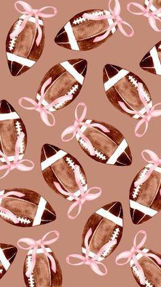 an image of sports balls with pink bows on them seamless fabric pattern design for wallpaper