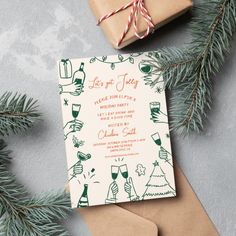 a christmas card with hand drawn images on it next to presents and pine branches,