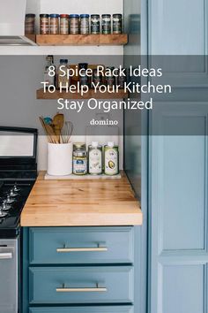 a kitchen with blue cabinets and wooden counter tops that says spice rack ideas to help your kitchen stay organized