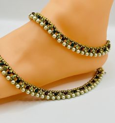 Beautiful ladies silver pleated anklets in gold with multi Festive Metal Anklets With Latkans, Festive Gold Anklets With Stone Work, Elegant Stone Work Anklets For Festive Occasions, Festive Anklets With Stone Work, Elegant Gold Anklets For Festive Occasions, Elegant Gold Festive Anklets, Gold Anklets With Stone Work For Festivals, Elegant Metal Anklets With Ankle Strap, Elegant Tilla Anklets For Festivals